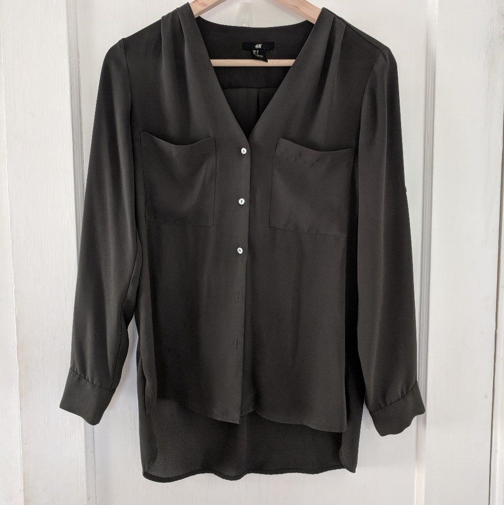 Flowing button up top